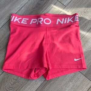 Nike Pro Women's Pink Athletic Bike Shorts with Branded Waistband